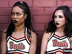 Cheerleaders signing contract with devil